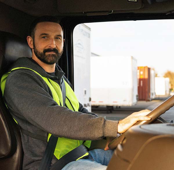 Happy local truck driver with a trucking career